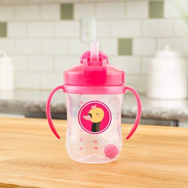 Pink Ostrich Baby's First Straw Cup Sitting on Kitchen Counter