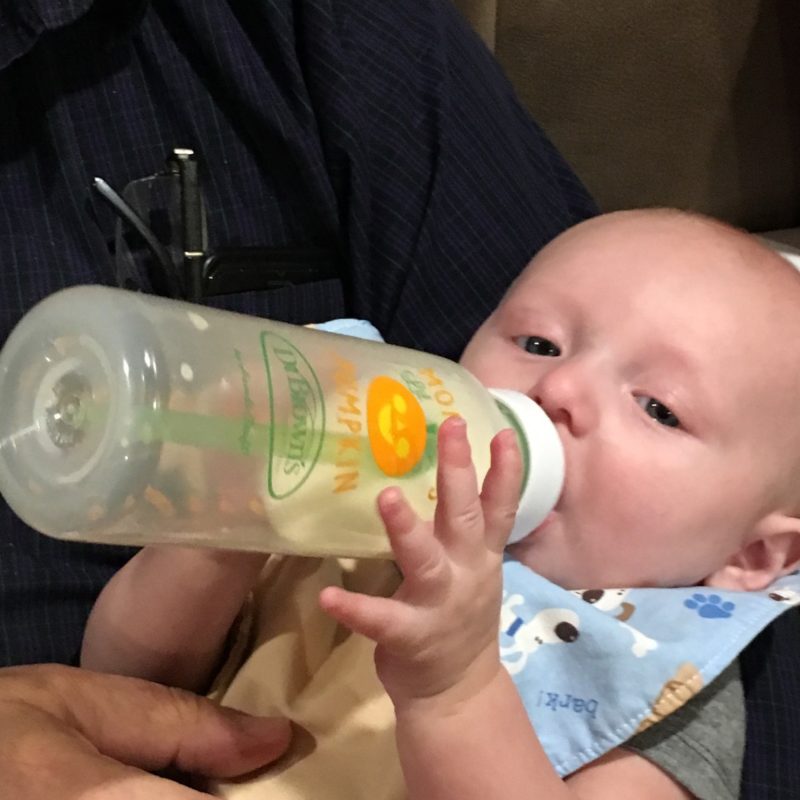 Zane drinking from Dr. Brown's bottle