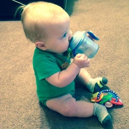 Bentley drinking from sippy cup