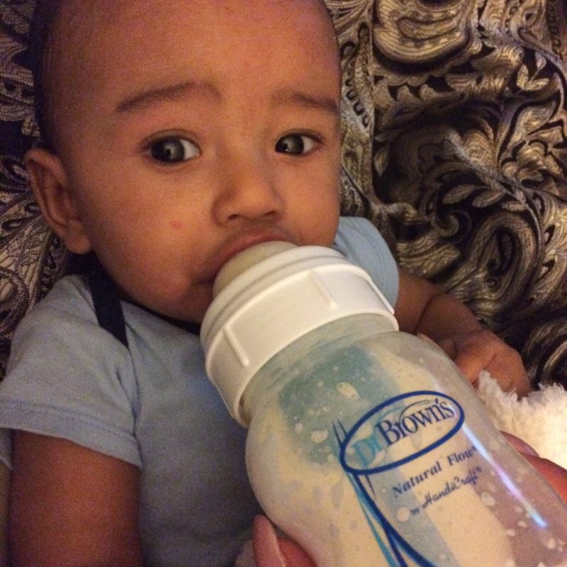 Cayden drinking from Dr. Brown's bottle