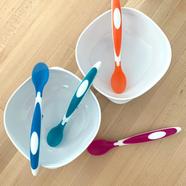 Dr. Brown's Temp Check Spoons on a counter with bowls