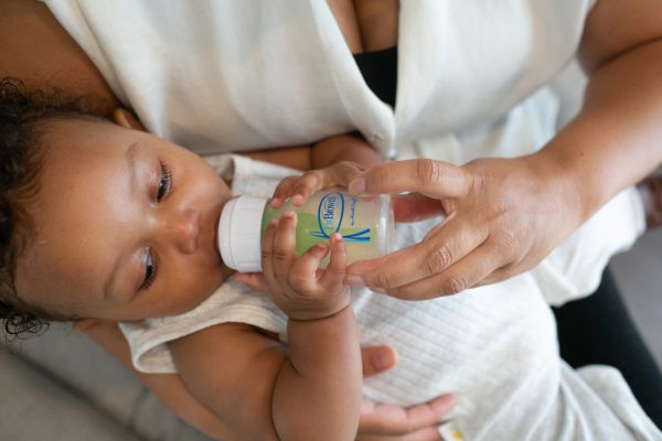 Baby feeding on a Narrow 2 ounce bottle