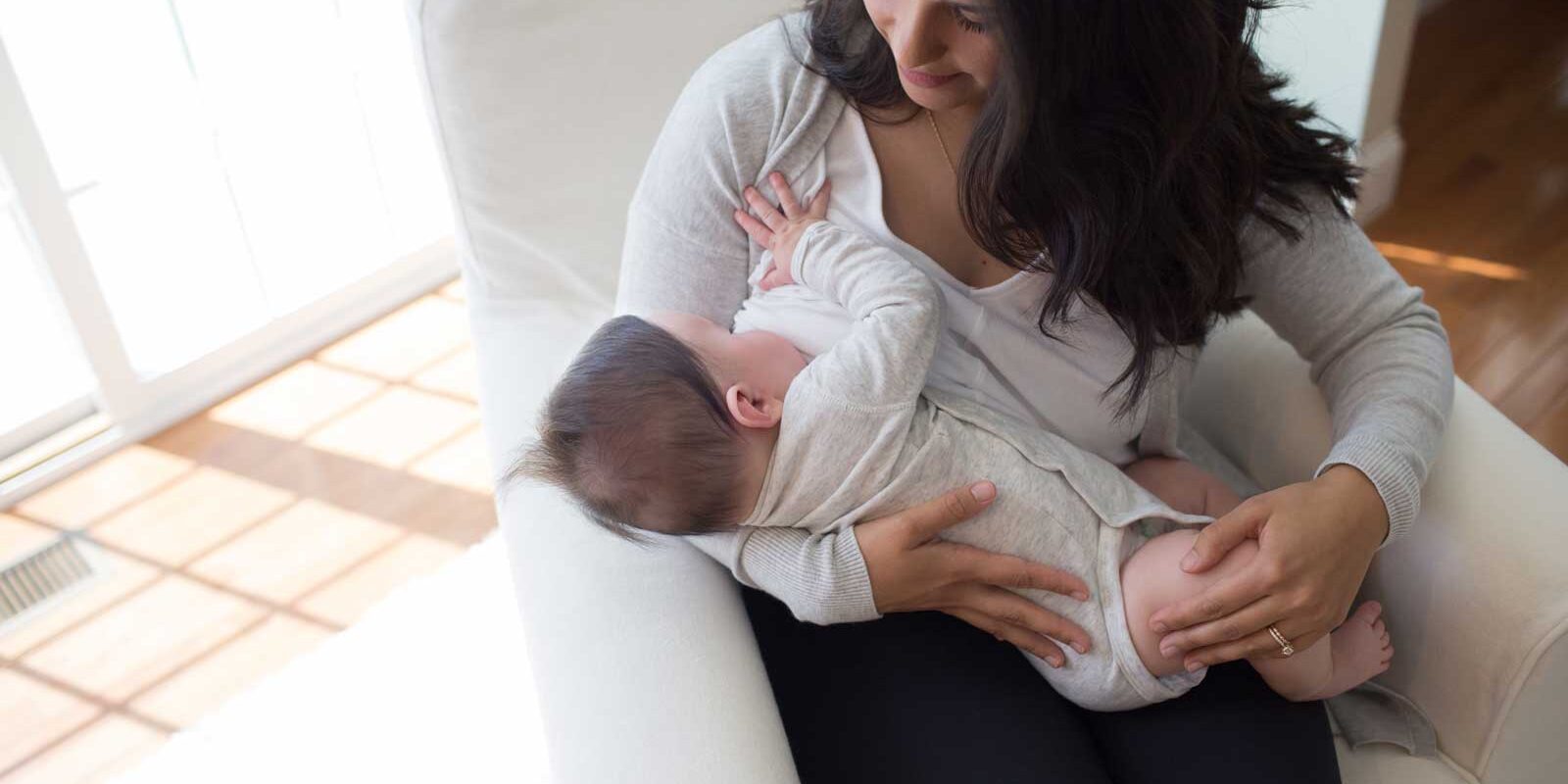 Parent breastfeeding their infant