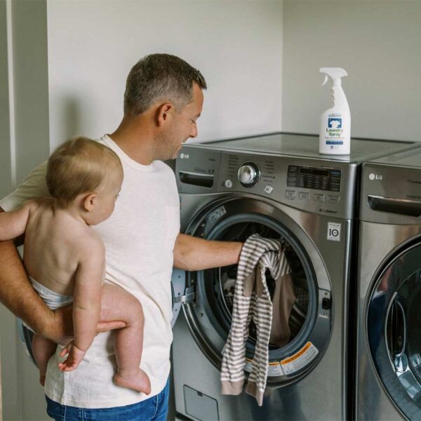 Parent putting in laundry