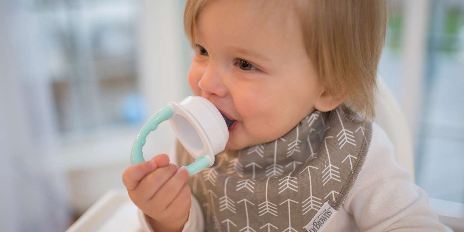 Toddler with a Silicone Feeder in their mouth